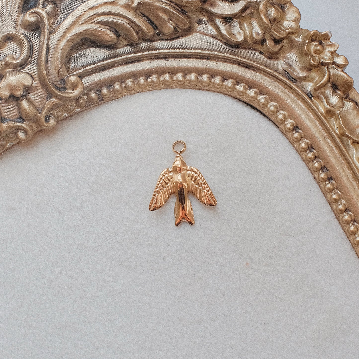 Gold Swallow Charm