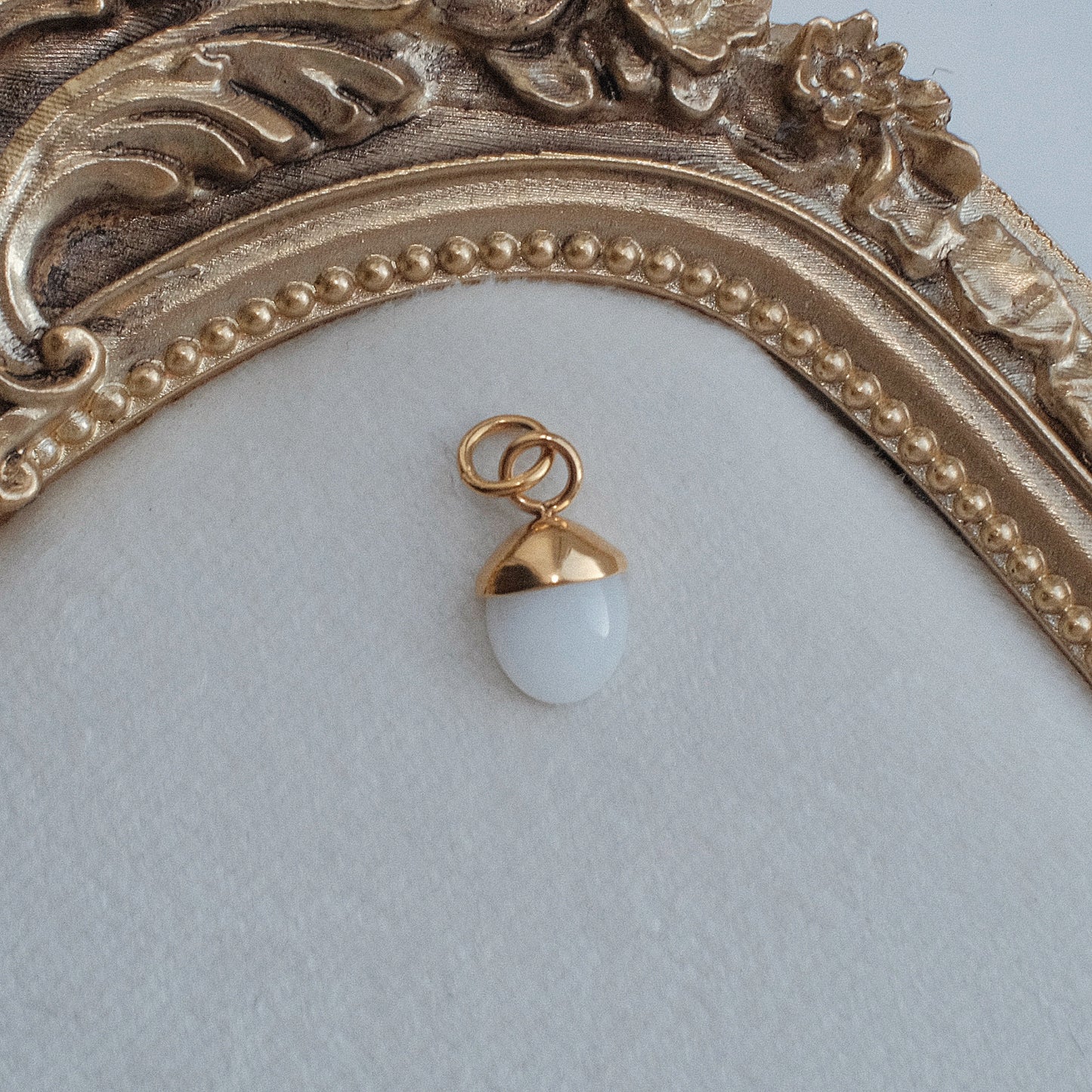 Gold and Moonstone Charm