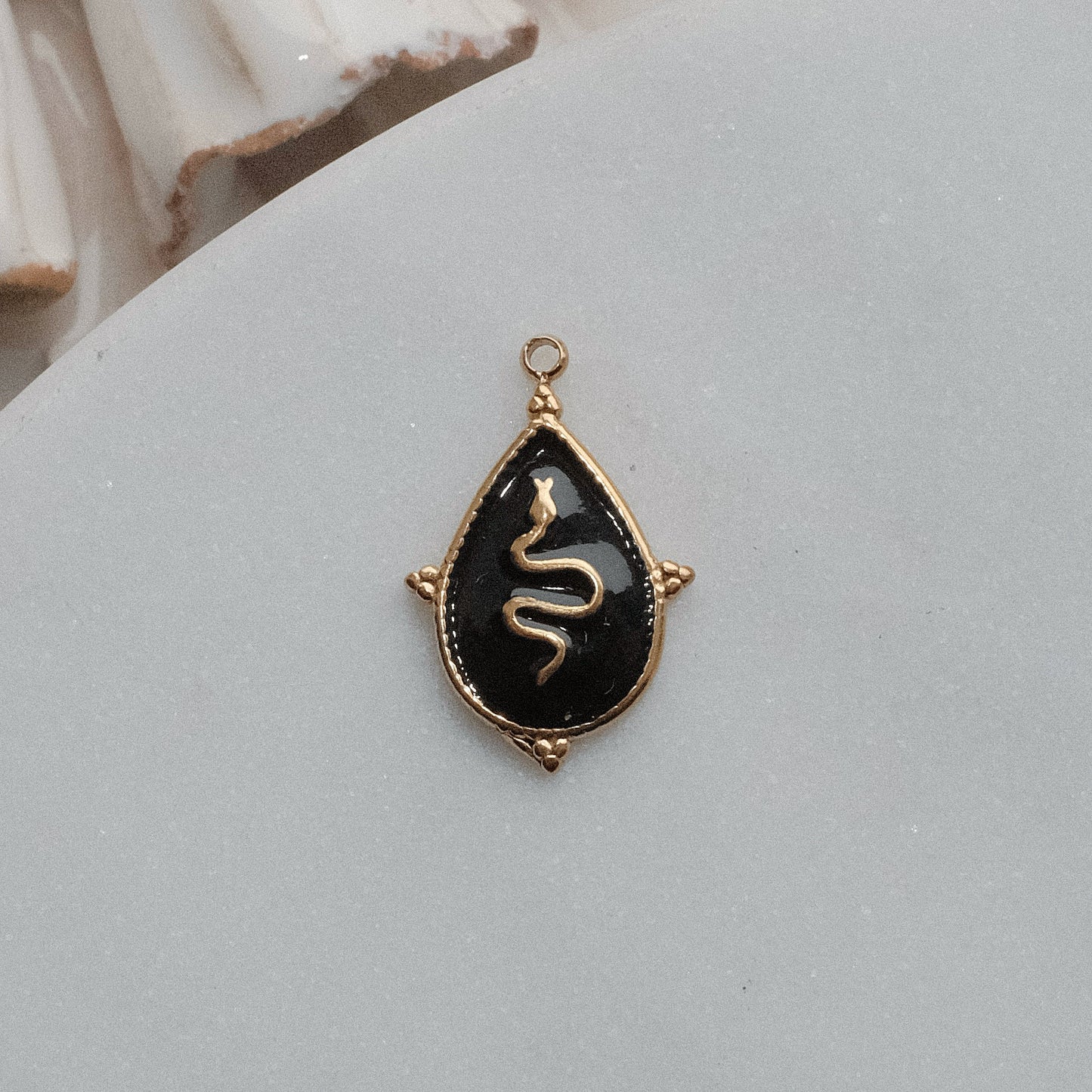 Gold and Black Snake Charm