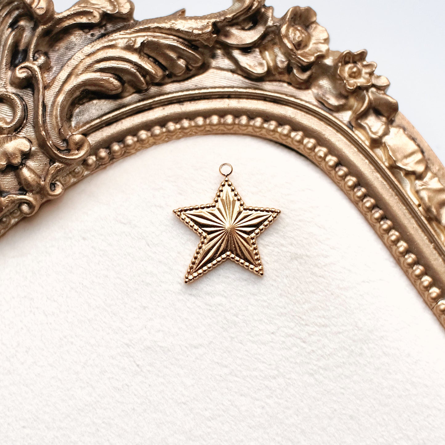 Gold Beaming Star Charm