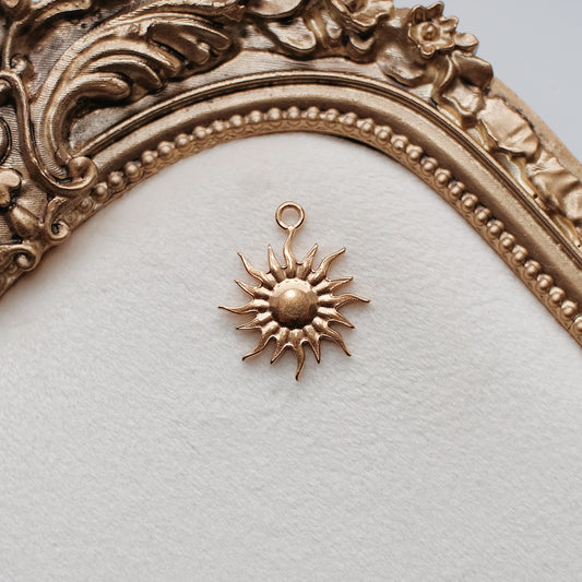 Gold Sun Charm