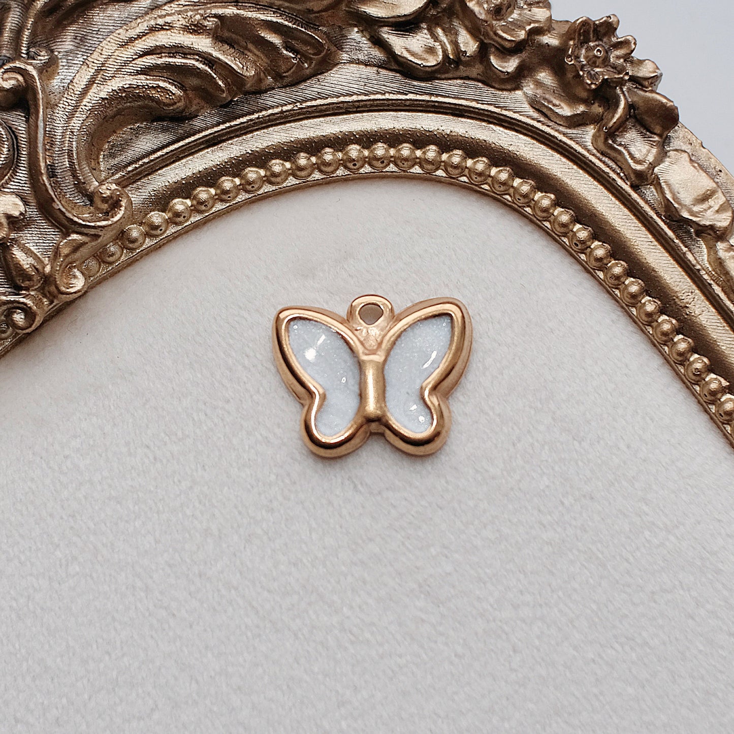 White and Gold Butterfly Charm