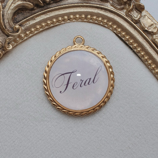 Gold Feral Charm