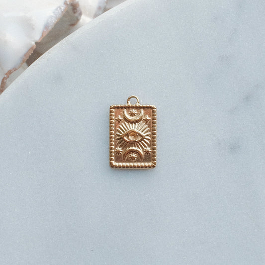 Gold Eye and Moon Charm