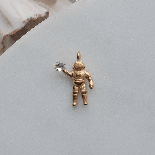 Gold Spaceman with Star Charm