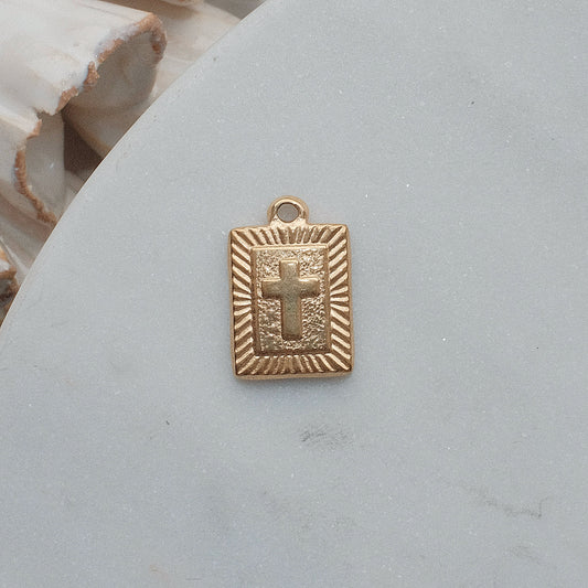 Gold Beaming Cross Charm